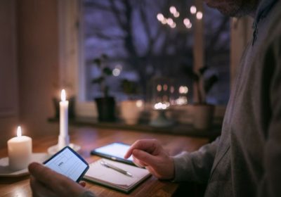 Man working without electric light